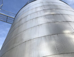 Pulsed fiber laser cleaned large stainless silo