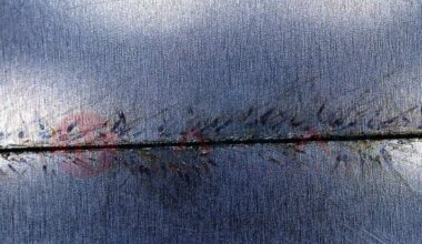 Laser cut aluminium foil enhanced under microscope