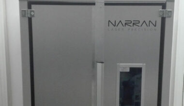 Enclosed pulsed fiber cleaning laser