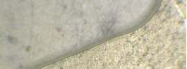 Laser cut plastic under a microscope
