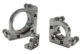 Vacuum holders for mirrors, lenses and iris diaphragms