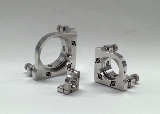 optical vacuum mirror holders