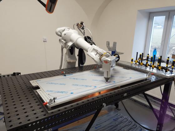Laser cutting robotic workstation