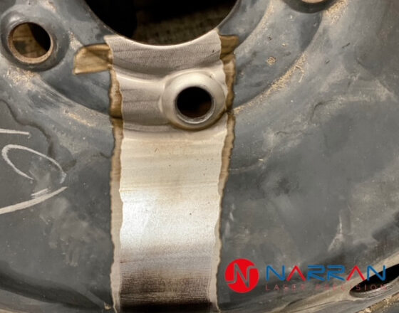 Laser powder coat cleaning