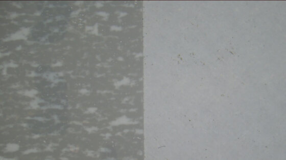 Glass coating removal with laser