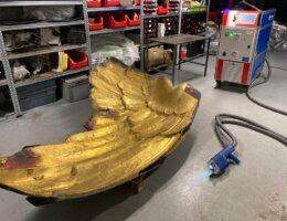 Laser gold layer removal