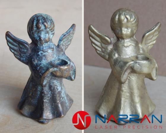Laser cleaning brass statue