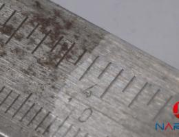 Removal of congealed lubricants and surface rust caused good scale visibility.