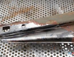 Partially removed dirt from the old Jawa as part of the laser cleaning process