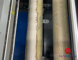 Efficient adhesive removal from machinery rollers using advanced laser technology.