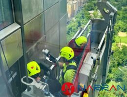 Eco-friendly laser cleaning of Central Park Tower's exterior in New York.
